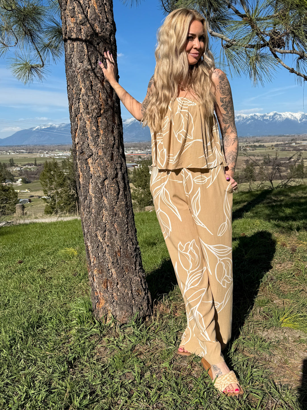 The Callie Jumpsuit - strapless, wide-leg jumpsuit with a floral sketch print