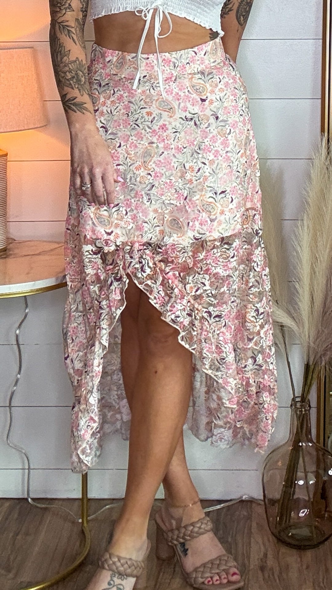 The Meadow Maxi Skirt - high-waisted fit, soft ruffles, and a bold high-cut front with paisley design 