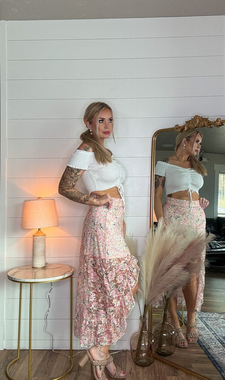 The Meadow Maxi Skirt - high-waisted fit, soft ruffles, and a bold high-cut front with paisley design 