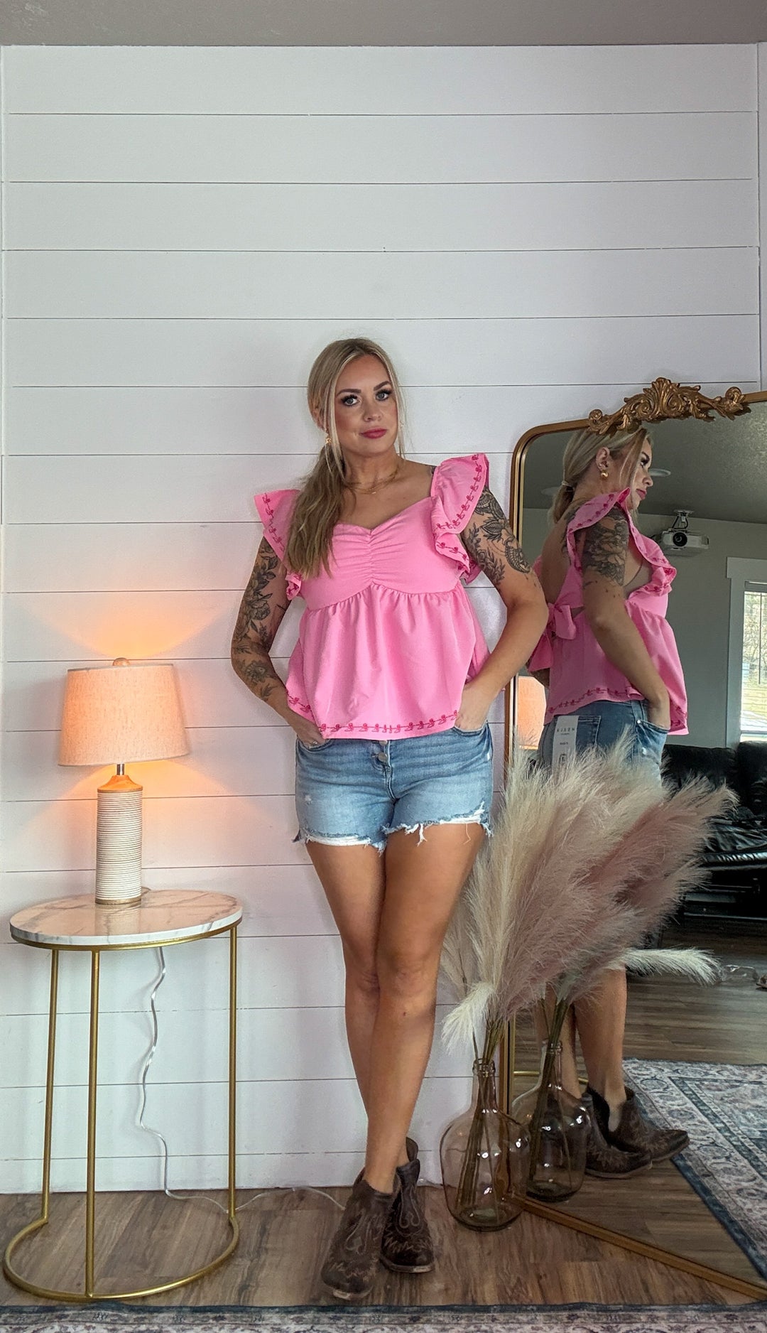 The Brielle Blouse - Pink top with embroidered cowboy boots and bow tie in the back 
