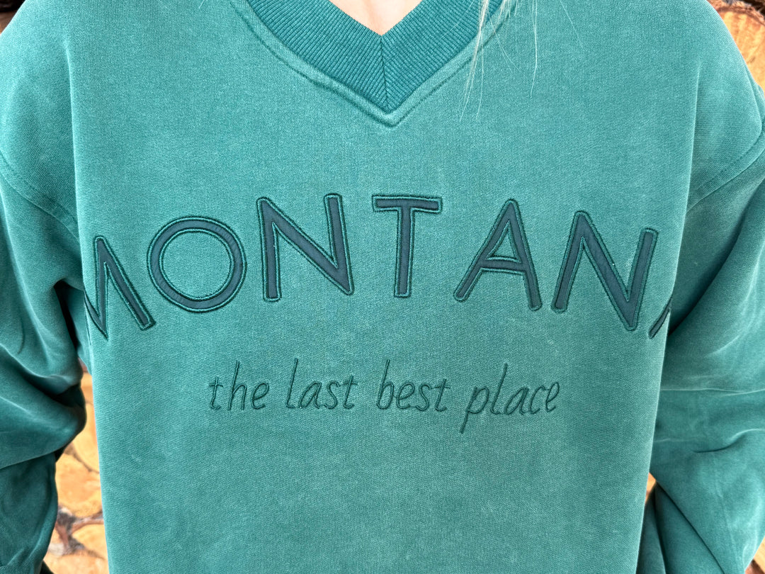 Teal sweatshirt with 'MONTANA the last best place' text