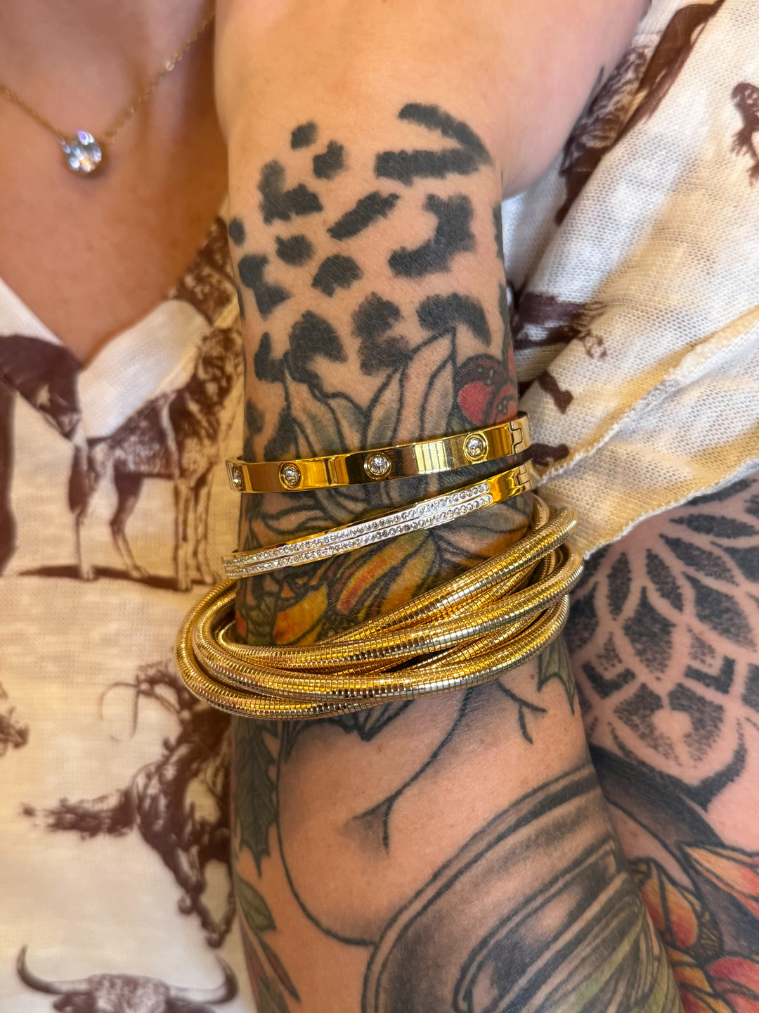 Golden Dunes Bracelet Stack - five interlocked bangles, stretchable 