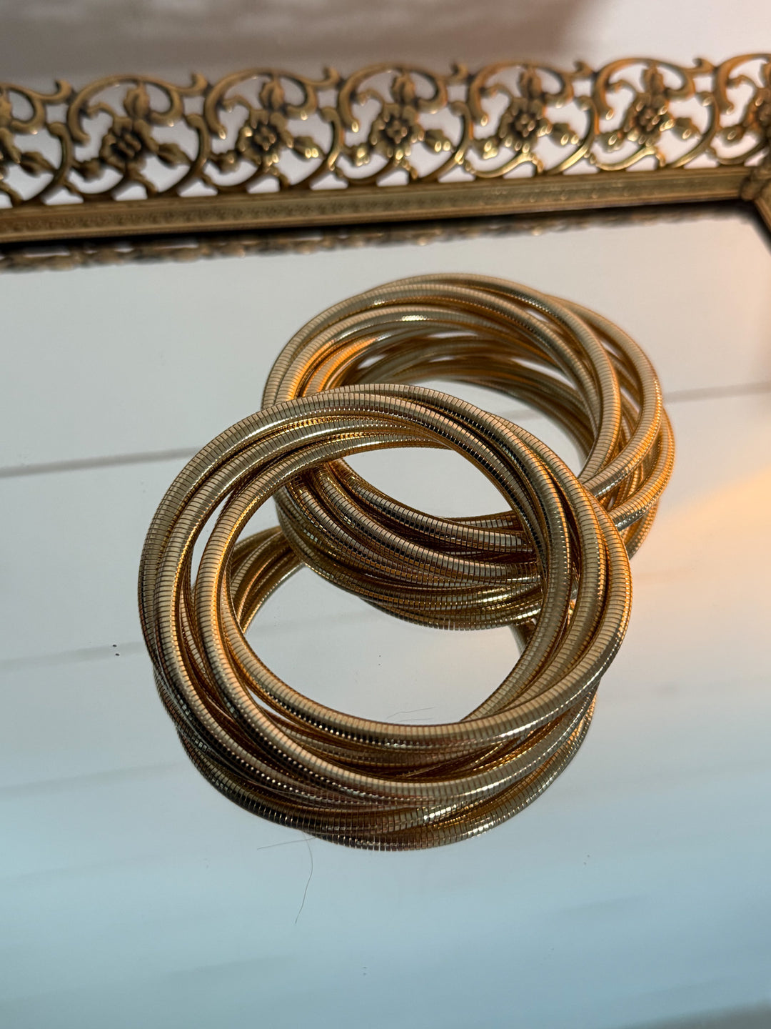 Golden Dunes Bracelet Stack - five interlocked bangles, stretchable 