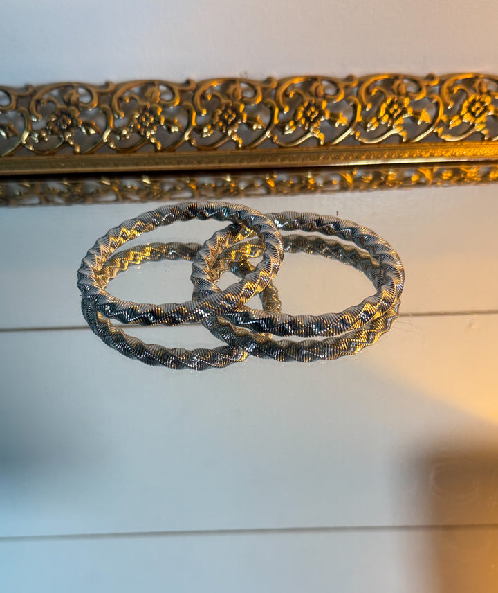 The Aspen Ridge Bangle - designed with a subtle, wave-like pattern, stretchable