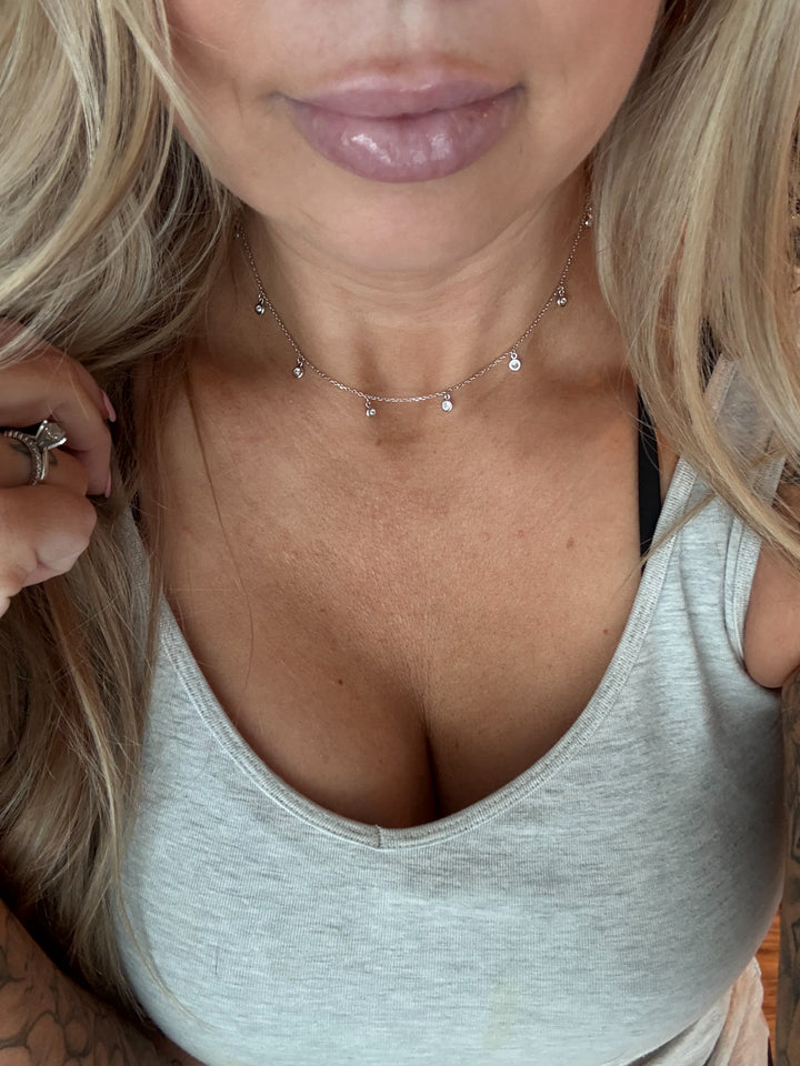 The Stella Drop Necklace - Crafted from 925 sterling silver, this dainty 13.5" chain features tiny bezel-set accents 