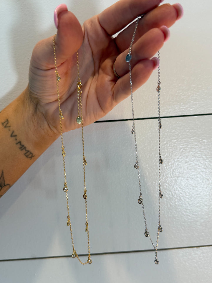 The Stella Drop Necklace - Crafted from 925 sterling silver, this dainty 13.5" chain features tiny bezel-set accents