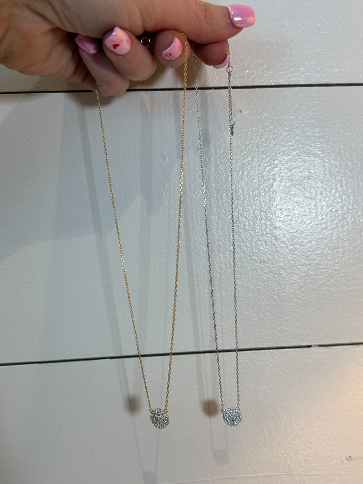 The Celeste Pendant Necklace - 925 sterling silver,  features a dazzling pavé crystal disc