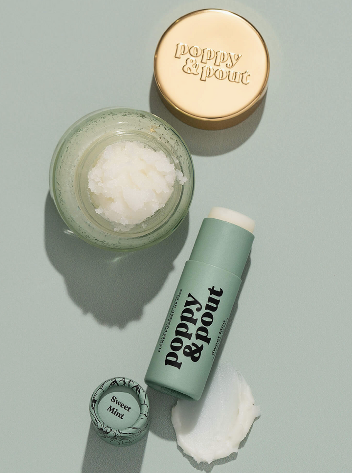 Poppy & Pout lip balm and jar on a gray background
