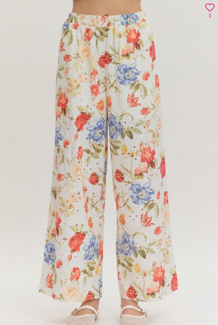 Floral patterned pants on a white background